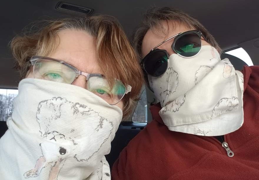 My wife and I wearing easter napkins as face coverings.