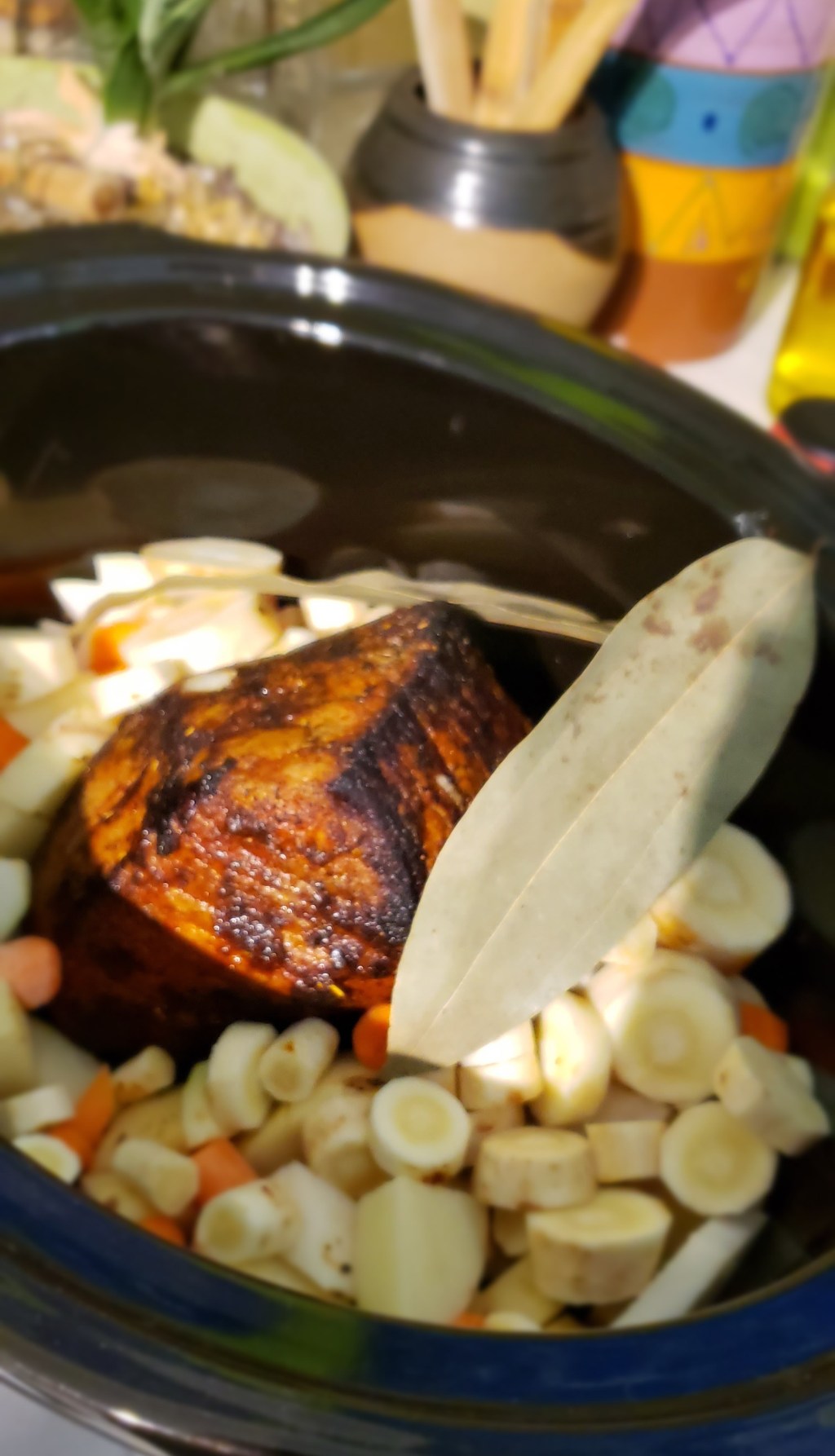roast and vegetables in a slow cooker