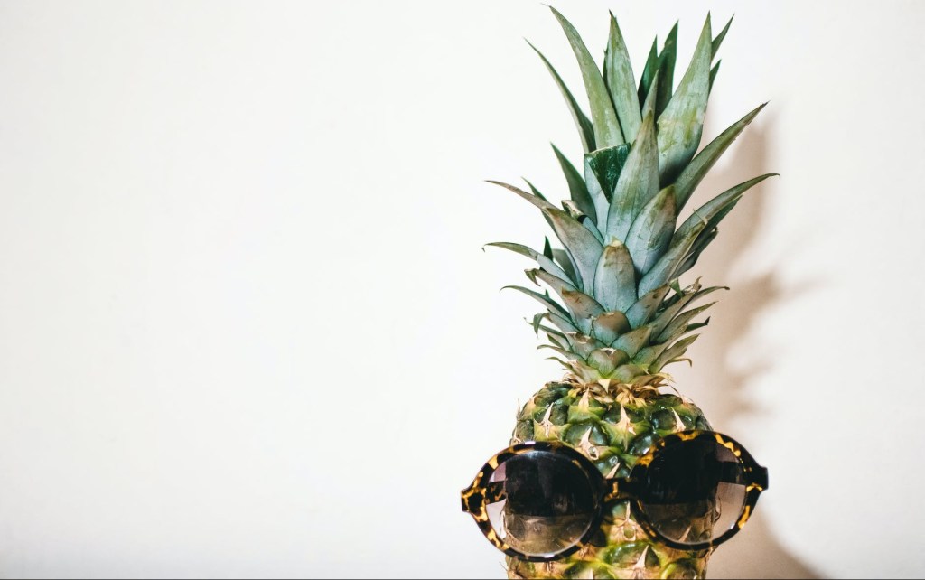 pineapple wearing sun glasses