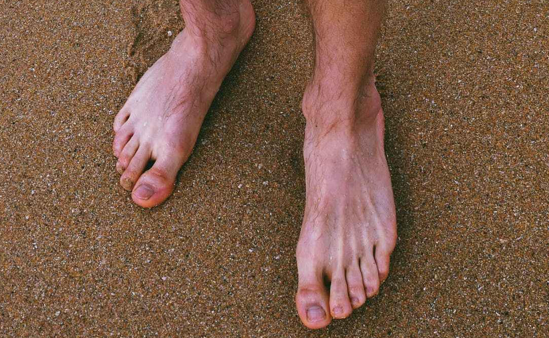 man's bare feet