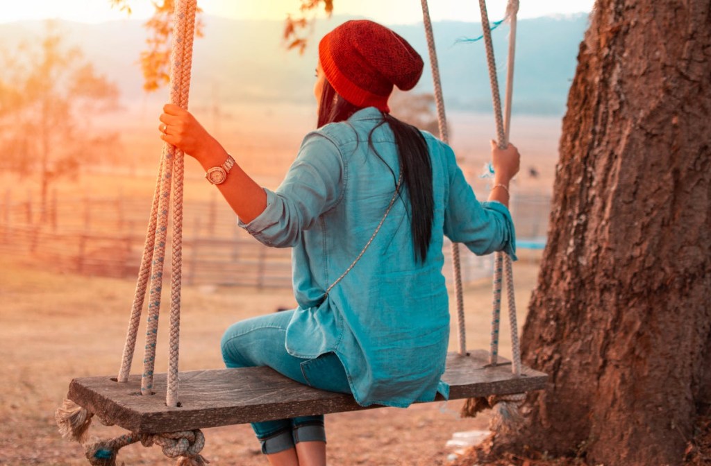 woman on a tree swing