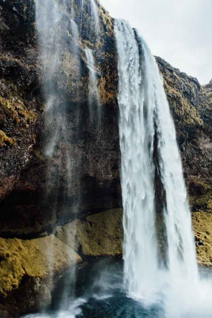 water streaming over a cliff