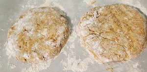2 circles of dough flattened and floured