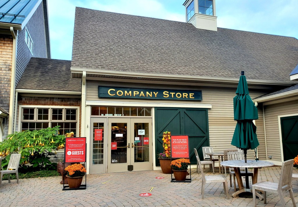 Company store with many social distancing signs