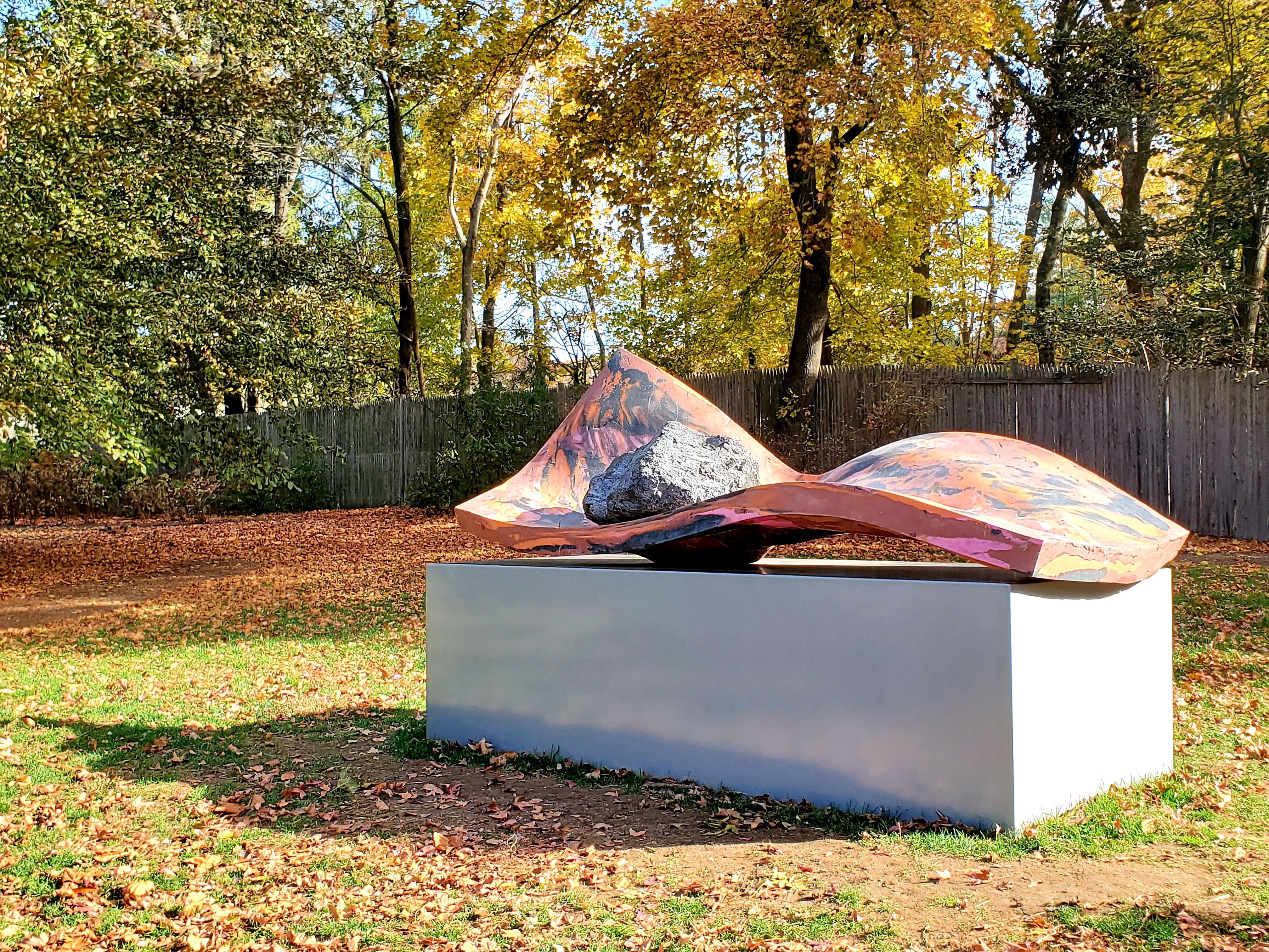 cast concrete, pigment, powder coated steel, quarried obsidian