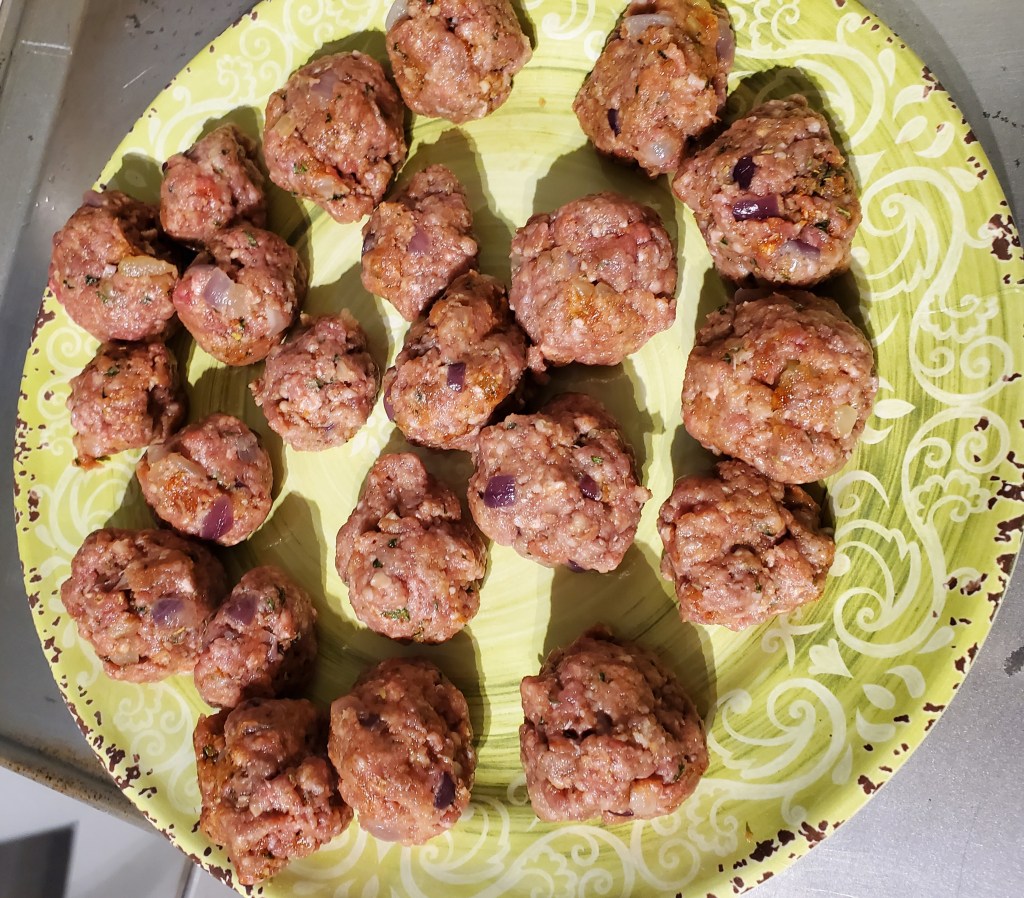 Meatballs on a plate pre-flour