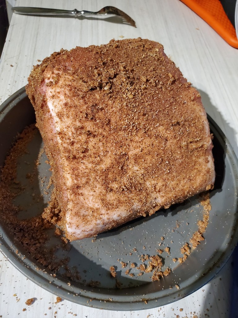 Pork Butt covered in dry rub
