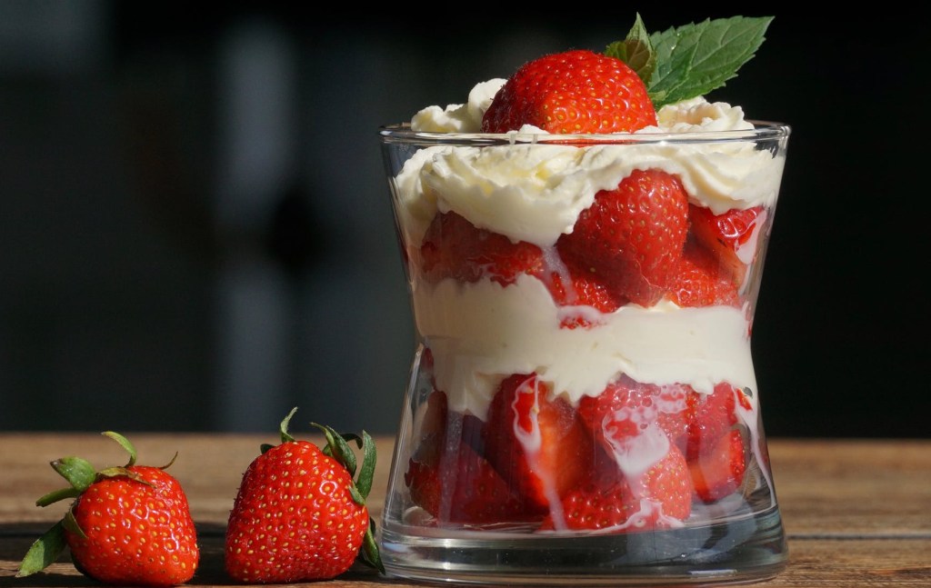 Straweberries with cream in a glass