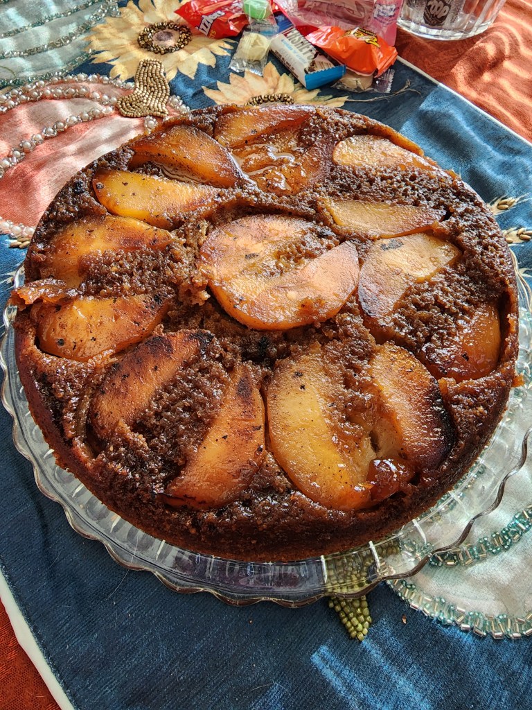Finished upside down cake on a glass plate